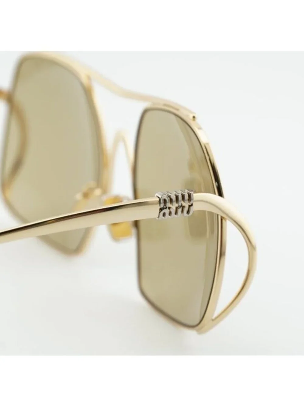 Miu Miu MUA55S 5AK10R Sunglasses Gold Geometric Frame, Yellow Lenses